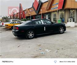 دۆج چارجەر